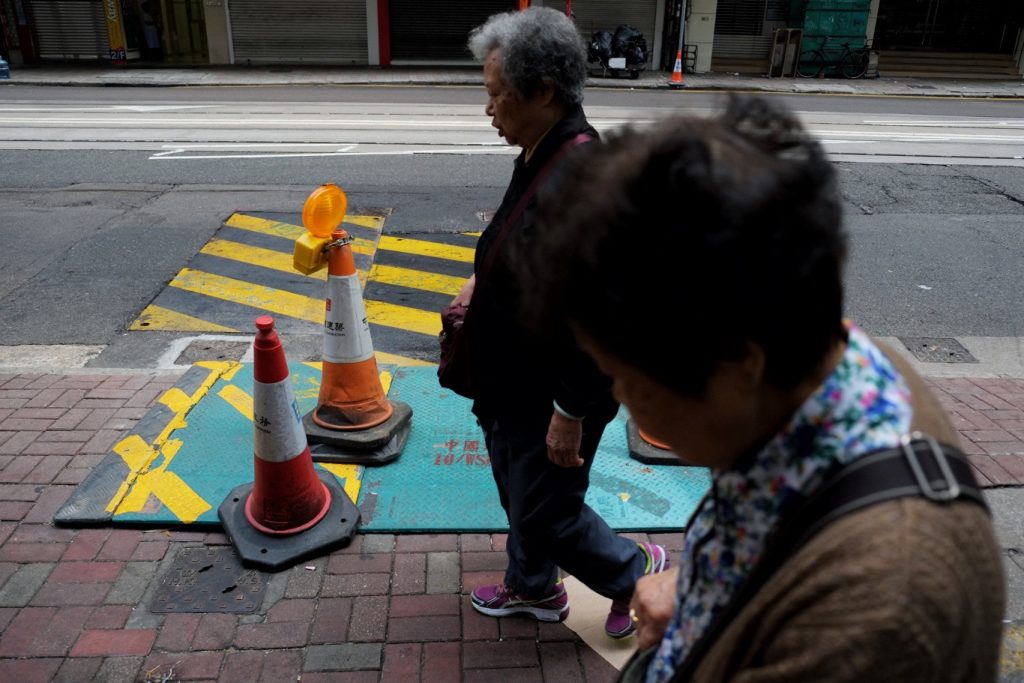 Senior citizen at Central, Hong Kong by Saifulrizan